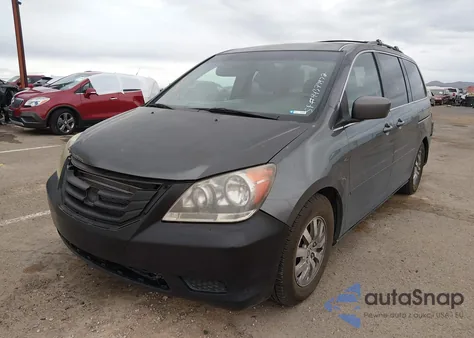 2010 Honda Odyssey Ex z USA, uszkodzony, nr VIN 5FNRL3H46AB048659